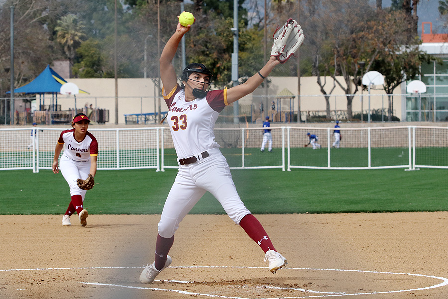 Britney Lopez has two no-hitters in her PCC softball career. She fires a pitch in Tuesday's blanking, photo by Richard Quinton.