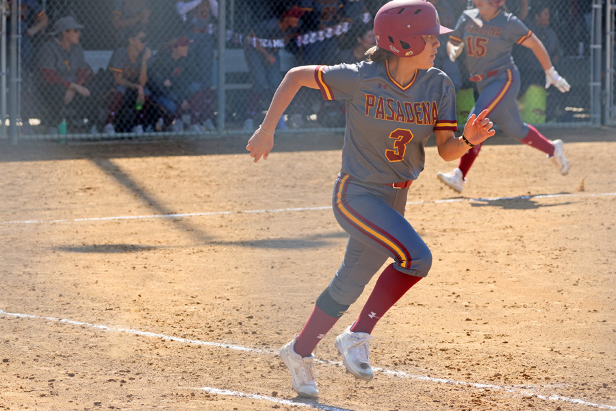 Gabi Perez runs up the line after a run-scoring hit to bring in Giselle Lopez during PCC's win on Friday (photo by Richard Quinton).