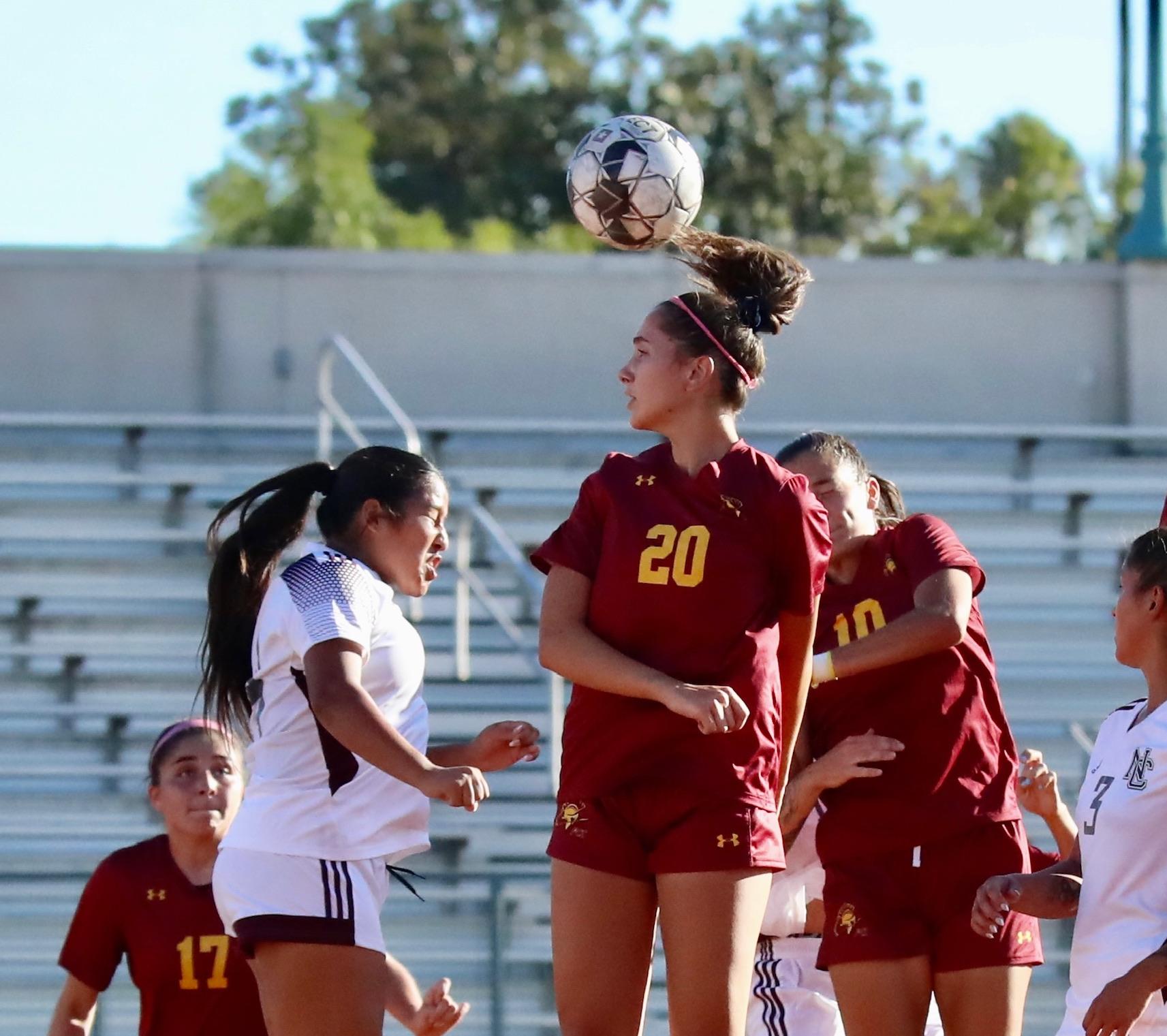 Olivia Aguilar (#20) picked up a goal and assist in Tuesday's loss v. Compton. Here she is in action during a recent game (photo by Michael Watkins).