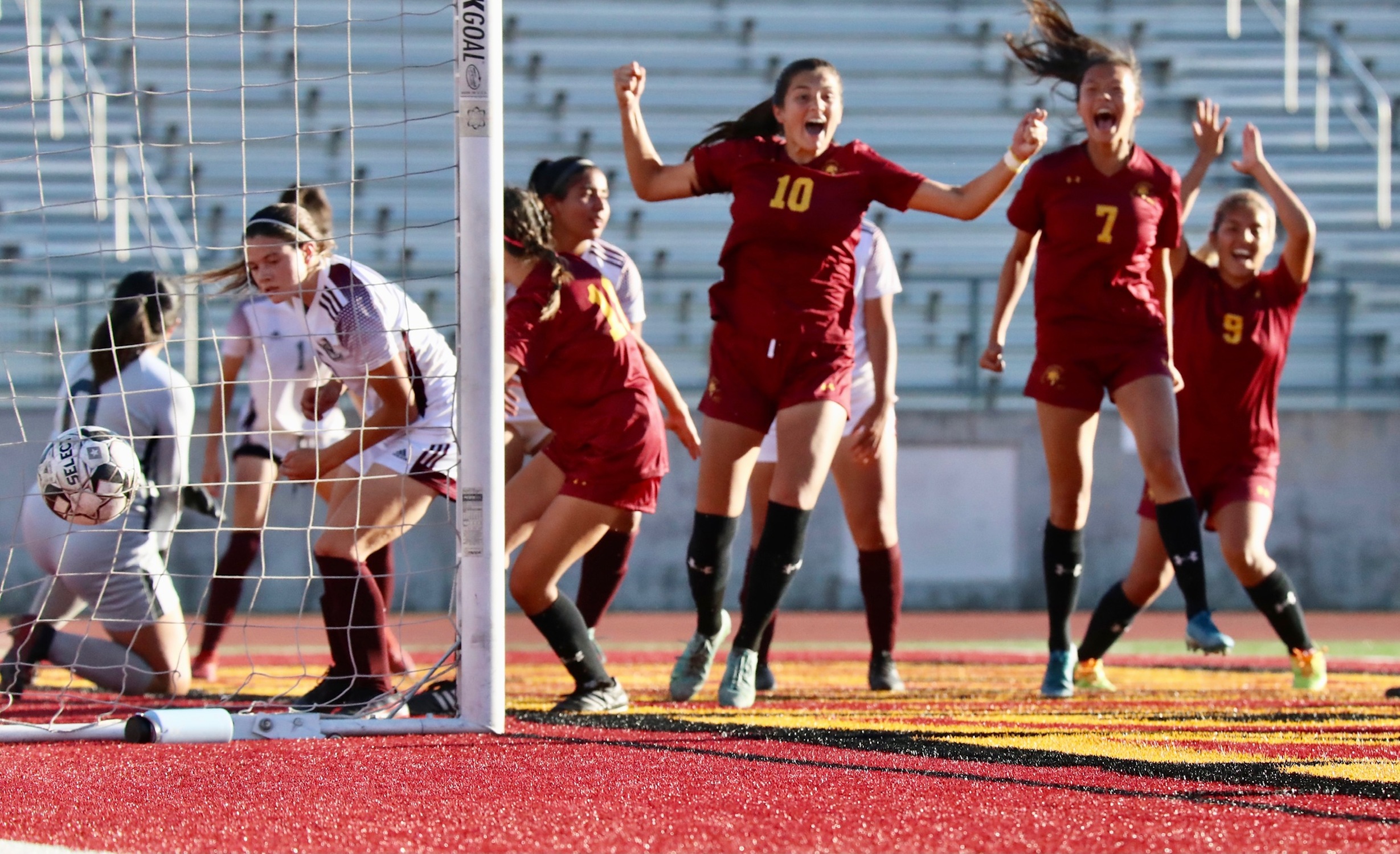 Juanita Diaz and teammates get excited following her game-tying goal in PCC's 2-1 win over Norco on Tuesday at Robinson Stadium (photo by Michael Watkins).